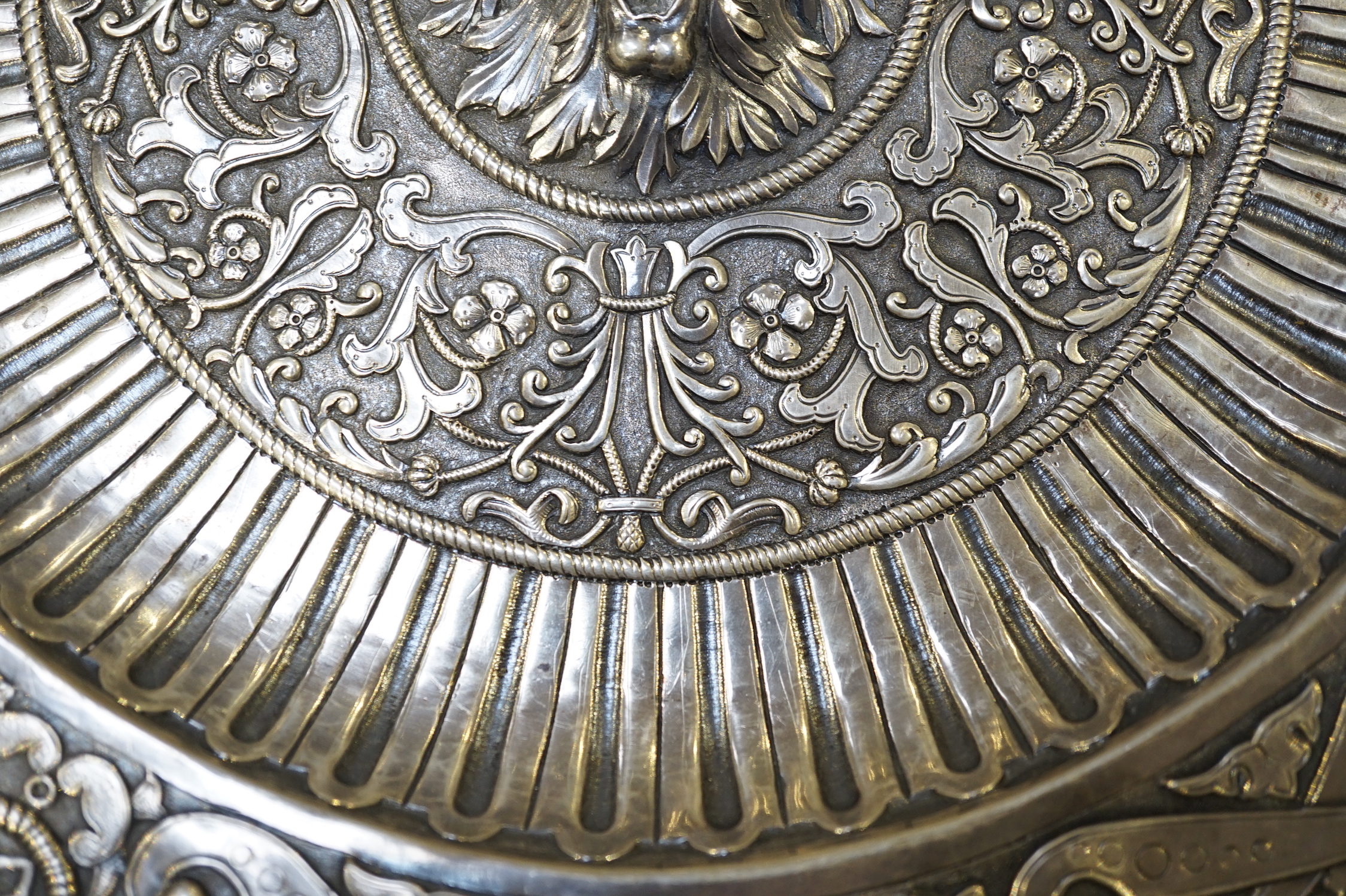 A 20th century Portuguese/Spanish embossed silver charger